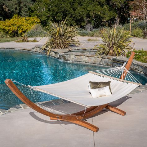 This canvas hammock comes complete with a larch wood frame so it can be set up anywhere you choose. Larch wood is highly valued for its durable and waterproof attributes, making this hammock a quality addition to your outdoors. Hammock By Pool, Free Standing Hammock Outdoor, Hammock Ideas, Garden Swings, Patio Hammock, Double Hammock With Stand, Backyard Hammock, Hammock Stands, Outdoor Hammock