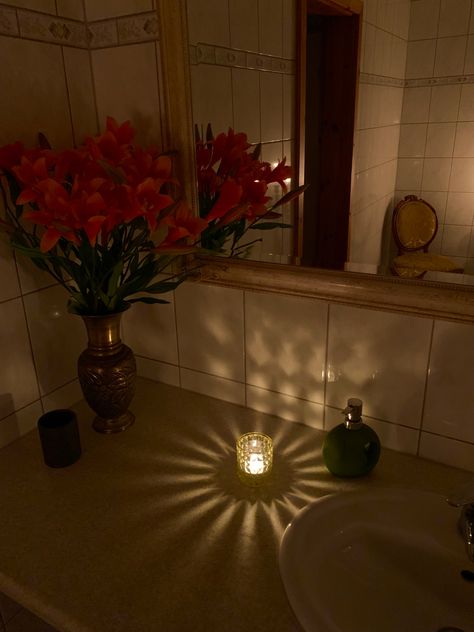 Candle lit with flowers #softaesthetic #softgirl #cottagecore #lanadelreyaesthetic #bathroom #bathroominspo #mirroraestetic #bathroommirror Candles In Bathroom, Candle Night, In Bathroom, Bathroom Inspo, Cottage Core, Bathroom Sink, Bathroom Lighting, Bathroom Mirror, Candles