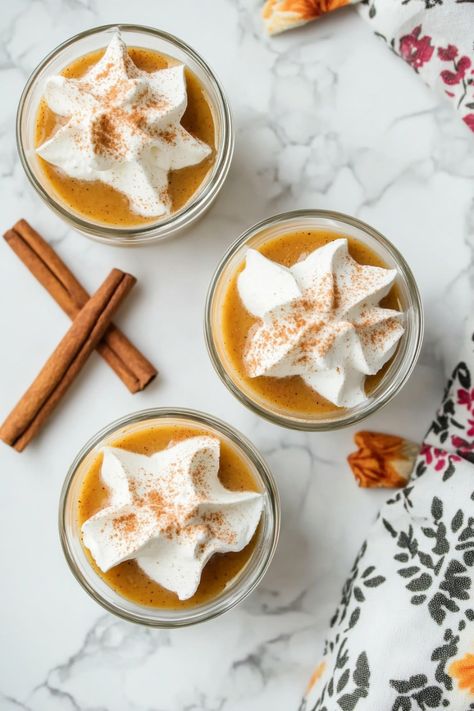 Indulge in the ultimate fall treat with these creamy and delicious pumpkin pie pudding shots. Perfect for holiday gatherings or cozy nights in, these little desserts are sure to be a hit with family and friends. The rich pumpkin flavor combined with a hint of spice will have everyone coming back for more. Whether you serve them at a Halloween party or Thanksgiving feast, these pudding shots are a festive way to celebrate the season. Pumpkin Pie Pudding Shots, Pumpkin Pie Pudding, Best Pumpkin Pie, Pudding Shots, Easy Pumpkin Pie, Instant Pudding Mix, Vanilla Vodka, Vanilla Pudding Mix, Pumpkin Pie Recipes