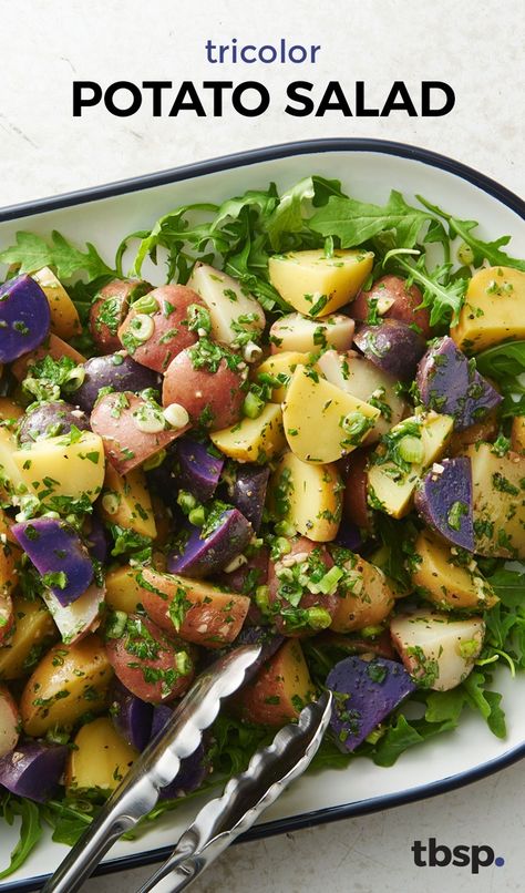 This pretty riff on traditional French-style potato salad lets the tricolor potatoes shine with loads of herbs and olive oil instead of heavy mayo. A perfect side for Easter, a potluck, or any dinner - it's our new go-to for something light and tasty. Expert tip: Small tricolor potatoes usually come in 1 1/2-lb bags. Want more purple? Look for baby purple potatoes in the same-sized bags at gourmet grocers. Vegan Greek Yogurt, Springtime Recipes, Potato Salad Dressing, Potato Salad With Egg, Baby Purple, Easy Potato Salad, Purple Potatoes, Potatoe Salad Recipe, Salad Dressing Recipes