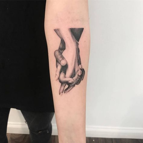 Holding hands on the left inner forearm. Tattoo Of Hands Holding, Tattoo Of Hands, Hands Holding Something, Two Hands Tattoo, Hand Holding Tattoo, Hand Holding Something, Tattoo Off, Holding Something, Father Tattoos