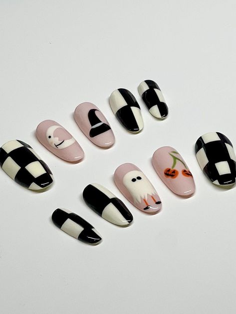 *Seen in Medium Round* All press on nail sets are custom handmade to order. All nail colors & designs can be created in any shape & length that are available. All press on nail sets are created using Aprés Gel X tips & gel polish, providing you with only the highest quality. PLEASE refer to the sizing chart. All nails are made to the sizing you provide at checkout.  My shop has standard sizing (refer to photo in listing), but you can write in your custom nail sizing if your measurements don't ma Press On Nail Inspiration, Minimalistic Halloween Nails, Halloween Patchwork Nails, Halloween Nails Subtle, Short Cute Halloween Nails, Cutesy Halloween Nails, Spoopy Nails, Checkered Halloween Nails, Retro Halloween Nails