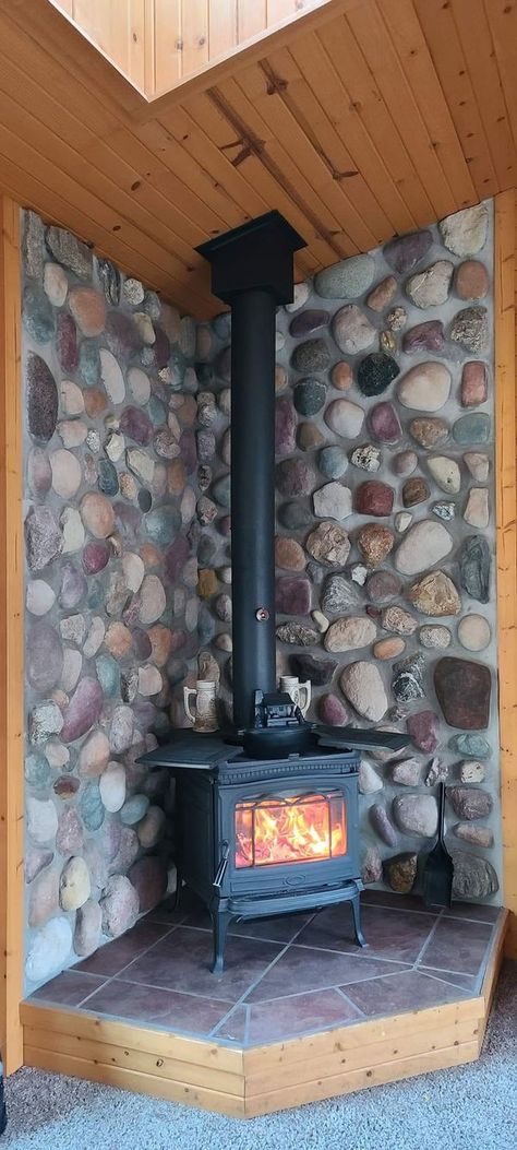 Old Wood stoves, Coal Stoves, Antique Stoves,& Masonry Heaters. | When I added an addition to my house, I decided to install a wood burning stove | Facebook Wood Stove Back Wall, Kitchen Wood Burning Stove, Old Wood Burning Stove, Wood Stove Platform Ideas, Tile Wood Stove, Stone Wood Stove Surround, Antique Fireplace Ideas, Wood Burning Stove Hearth, Wall Behind Wood Stove Ideas