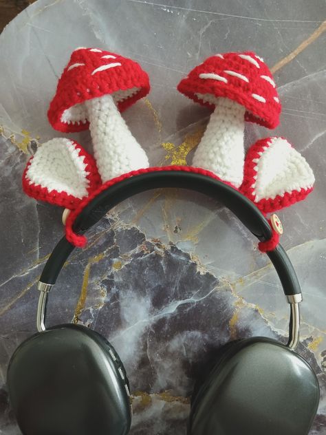 Each design is specially crafted to fit your uniquely shaped headgear! This originally designed crocheted item will add more personality to your headphones and is 100% handmade! Crochet Ideas For Headphones, Crochet Ideas Mushroom, Crochet Mushroom Headband, Crochet For Gamers, Crochet Mushroom Free Pattern, Crafted Gift Ideas, Headphone Covers Crochet, Crochet Headphones Accessories, Christmas Crochet Ideas Diy Gifts