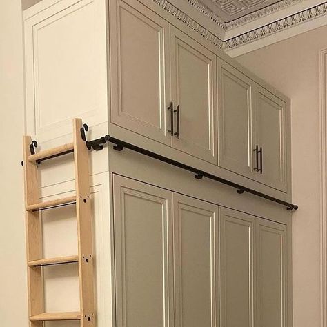 LLCompany | UK on Instagram: "🌟 Explore the innovative design of this sleek built-in wardrobe by @tempus4_ltd 🚪 This bespoke creation includes a custom-built ladder, maximizing every inch of available space. Our hook-on hardware from @libraryladderco elegantly stows the ladder upright, ensuring no compromise on room space. Discover how this design showcases the perfect harmony between functionality and style! . . . . #builtinwardrobe #customdesign #interiordesign #spacesavingsolution #innovativestorage #bespokefurniture #homeorganization #interiorladder" High Wardrobe Design, Built In Wardrobe With Ladder, Tall Built In Wardrobe, Closet Ladder Ideas, Wardrobe With Ladder, Tall Closet Organization, Closet With Ladder, Wardrobe Ladder, Ladder Closet