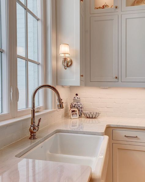 White Kitchen With Brick Backsplash, White Kitchen With Brick, Kitchen With Brick Backsplash, Cape Cod Kitchen Remodel, Cottage Kitchen Backsplash, Kitchen With Brick, Sconces In Kitchen, White Brick Backsplash, Kitchen Sconces