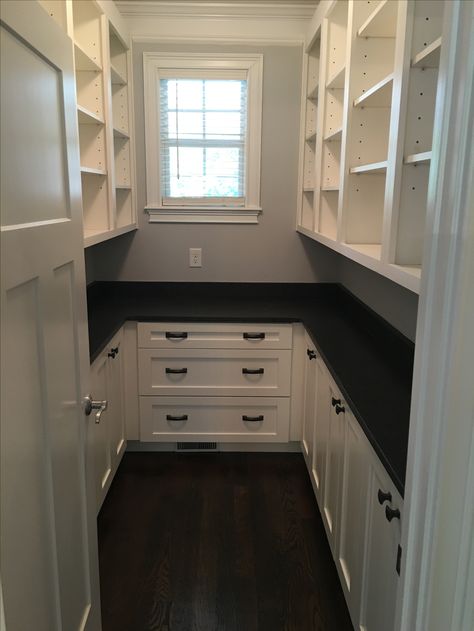 Large walk-in pantry with white shaker cabinets and honed dark granite Pantry Layout, House Pantry, Perfect Pantry, Cheap Kitchen Cabinets, Farmhouse Pantry, Pantry Room, Pantry Remodel, White Shaker Cabinets, Large Pantry