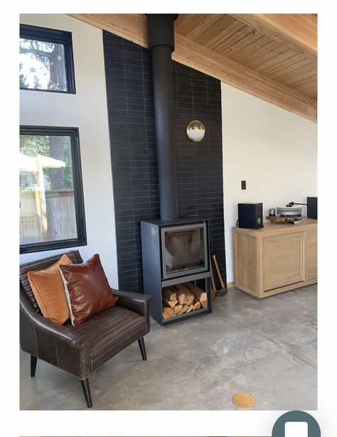 Modern Stove Fireplace Ideas, Black Tile Wood Stove, Wood Stove Wall Protection, Black Brick Wood Stove, Black Brick Behind Wood Stove, Tiled Wood Stove Surround, Wood Burning Stove Tile Ideas, Wood Stove Surround Modern, Woodstove Heat Shield