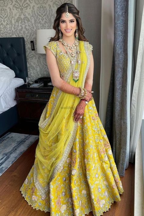 Presenting you latest embellished lehengas for brides for each function. #weddingbazaar #indianwedding #embellishedlehengamirror #embellishedlehengablack #embellishedlehengablouse #embellishedlehengaheavy #embellishedlehengared #embellishedlehengawhite #embellishedlehengagolden #embellishedlehengaivory #embellishedlehengablue #embellishedlehengasequin #embellishedlehengapearl #embellishedlehengagrey #embellishedlehenganet #embellishedlehengasilver #embellishedlehengafloral #embellishedlehenga Haldi Jewellery, Bride Collection, Best Indian Wedding Dresses, Haldi Dress, Heavy Lehenga, Dream Marriage, Wedding Dates, Latest Bridal Lehenga, Mehendi Outfits