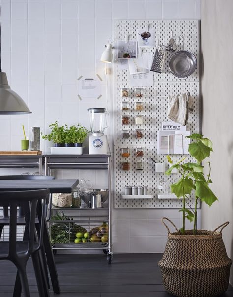 The new SKÅDIS pegboard from IKEA is quite the problem solver when it comes to storage. The customisable storage add-ons make it work great in kitchens, hallways bedrooms or craft rooms. Here three boards are secured to the inside of a walk-in wardrobe. Everything is on display in its place—even heels can hang on tool … Ikea Hack Storage, Pegboard Kitchen, Ikea Pegboard, Ikea Spice Rack, Ikea Skadis, Ikea New, Hack Ikea, Home Storage Solutions, Storage Hacks