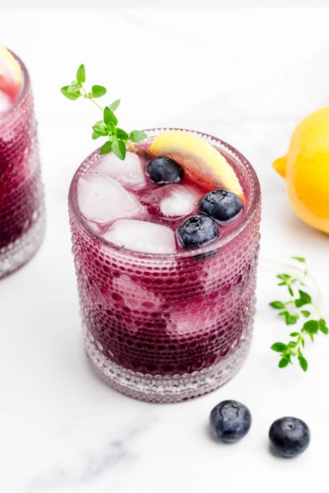 Fresh and bright, Blueberry Lemonade is the ultimate summer refresher. Make it with fresh fruit when it's in season for the most flavorful drink. Frozen Drinks Alcohol, Pitcher Drinks, Blueberry Picking, Citrus Squeezer, Blueberry Syrup, Make Simple Syrup, Blueberry Juice, Blueberry Lemonade, Sugar Free Syrup