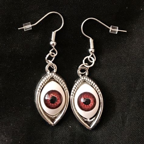 "This is a pair of silver earrings with eerily realistic brown glass eyeballs, that seem to always be looking at you. They are a really fun and a little spooky! Hung on fish hook ear wires, they are 2\" long, and just over 1/2\" wide. Make sure to check out my shop for more hair pins, jewelry, earrings, accessories, and all sorts of fun stuff!" Strange Earrings, Creepy Accessories, Eyeball Jewelry, Spooky Accessories, Eyes Creepy, Spooky Jewelry, Eyeball Earrings, Creepy Earrings, Eyes Jewelry