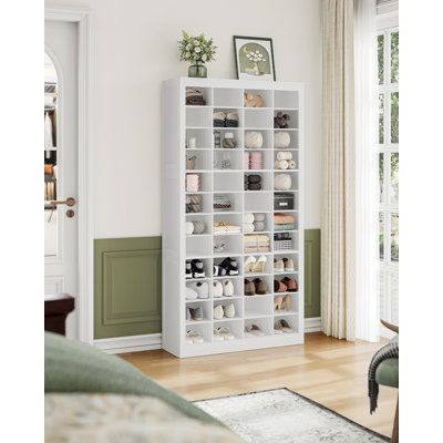 SPECIFICATIONS: Color: White Material: Particleboard Product Size: 12"D x 37.4"W x 72.4"H (30.5 x 95 x184 cm) Total Weight: 76.1 lb ( 34.5 kg) PACKAGE CONTENTS: 1 x Shoe Cabinet 1 x Accessory Bag 1 x Assembly Instructions Notes: Please attach the product to the wall with the included anti-tip kit Do not climb or play with this product Latitude Run® | Latitude Run® 12-Tier Widen Shoe Storage Cabinet, Free Standing Closet Organizers & Storage w / Open Cubbie, Space Saving Shoe Rack for Entryway | 48 | Wayfair Space Saving Shoe Rack, Standing Closet, Organizers Storage, Free Standing Closet, Closet Shoe Storage, Shoe Rack Entryway, Storage Closet Organization, Assembly Instructions, Closet Organizers