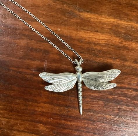 Silver Necklace with Dragonfly Pendant $50 Pair of Vintage Print “Dragonfly” $320 Fun dragonfly facts: The dragonfly can move at an amazing 45 miles an hour, hover like a helicopter fly backwards like a hummingbird, fly straight up, down and on either side. What is mind blowing is the fact that it can do this while flapping its wings a mere 30 times a minute while mosquitoes and houseflies need to flap their wings 600 and 1000 times a minute respectively. #dragonflyart #dragonflyjewelry Dragonfly Facts, Accessorize Jewellery, Dragonfly Jewelry, Dragonfly Necklace, Dragonfly Art, Dragonfly Pendant, Gem Necklace, Workout Accessories, Mind Blown