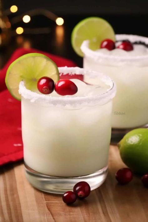 White Christmas Margarita - BeCentsational Christmas Margaritas, White Christmas Margarita, Christmas Margarita, Cranberry Margarita, Sanding Sugar, Silver Tequila, Christmas Cocktail, Festive Cocktails, Egg Nog