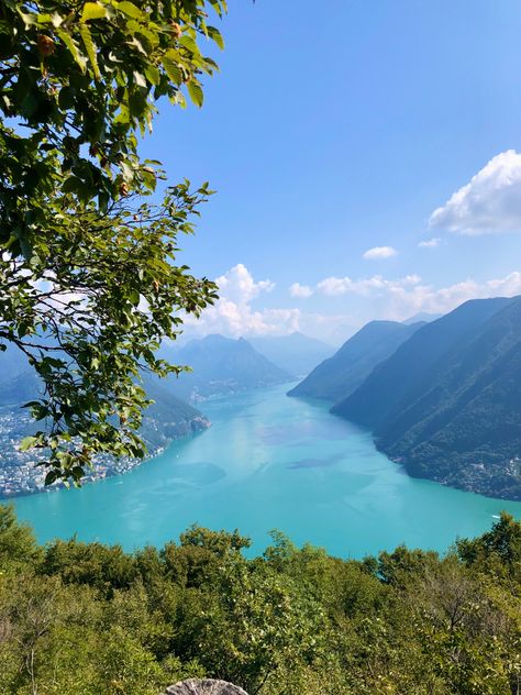 Picture of lake lugano running in between several hills/mountains 

Lugano, Switzerland, europe, europe aesthetic, European summer, european summer aesthetic, travel, aesthetic, summer, summer, vacation, summer aesthetic, summer in switzerland, summer in italy, euro summer, aesthetic, building, vacation vibes, summer vibes, vibes, travel inspo, lake, mountain, lake vibes, flowers, hike, hiking vibes, mountains Switzerland Aesthetic Summer, Switerzerland Summer, Summer In Switzerland Aesthetic, Lugano Aesthetic, Swiss Alps Aesthetic Summer, Zurich Switzerland Aesthetic, Lugano Switzerland Aesthetic, Switzerland Lifestyle, Switzerland Aesthetic Mountain