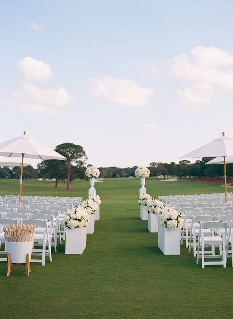 White Wedding Ceremony Decor, Golf Course Wedding Ceremony, Golf Wedding Theme, White Wedding Ceremony, Golf Wedding, Ceremony Chairs, Golf Course Wedding, Umbrella Wedding, Golf Club Wedding