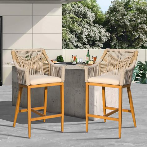 PRICES MAY VARY. 🍹✨Modern Aesthetics-- Domi outdoor bar chairs are polished a teak-colored varnished finish on the aluminum frame, this aesthetic appeal elevates your outdoor life time and is suitable for various outdoor settings, making them an excellent addition to your patio, balcony, or poolside. 🍹✨All-Weather Use Rope-- Textilene rope features in waterproof, UV-resistant, and fade-resistant, which make the backrest of domi outdoor bar stools being durable and strong. Plus, interweaving ro Outdoor Bar Stools With Backs, Outdoor Bar Chairs, Modern Outdoor Bar, Outdoor Counter, Tall Bar Stools, Patio Bar Stools, Counter Height Chairs, Patio Balcony, Counter Height Bar