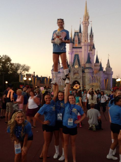 My favorite competition when I cheering throughout my life was the National High School Cheerleading Championship in Orlando, FL at Disney World. Here is me with my stunt group at the time posing in front of the beautiful Cinderella Castle. Cheer Nationals, Cool Cheer Stunts, Famous Cheerleaders, Cheer Dance Routines, Cheer Flyer, Cheer Team Pictures, Sideline Cheer, High School Cheerleading, Cheer Photography