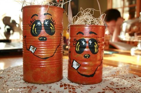 Made these several years ago from various food cans and put bags of candy in them for friends.  They were a big hit. Halloween Treat Holders, Recycled Tin Cans, Tin Can Art, Halloween Pumpkins Painted, Recycled Tin, Tin Can Crafts, Tin Canisters, Tin Cans, Fall Halloween Crafts