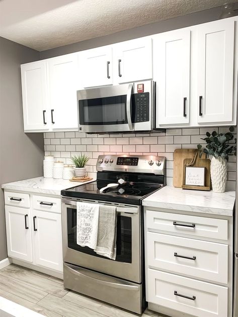 Small Kitchen Decor White Cabinets, Kitchen Decorating Ideas White Cabinets, Small White Kitchen Apartment, Grey And White Kitchen Decor Ideas, White Cabinet Kitchen Decor, Kitchen Decor White Cabinets, Townhome Kitchen Remodel, White Kitchen Cabinets Decor, Apartment Kitchen Remodel