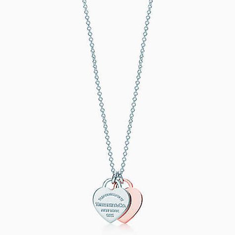 Return to Tiffany™ Double Heart Pendant. Inspired by a design from 1969, this popular collection is distinguished by a simple motif. Pendant in RUBEDO™ metal and sterling silver. Diamond Drop Necklace, Tiffany Necklace, Tiffany Jewelry, Diamond Drops, Delicate Jewelry, Drop Necklace, Locket Necklace, Tiffany & Co., Shop Necklaces