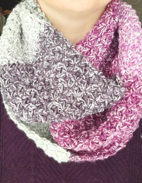 This free infinity scarf crochet pattern has so many great things about it. Not only is it a beautiful addition to your crochet accessories, but it is a quick and easy crochet project. Plus, it only takes one skein of Lion Brand Mandala Ombre yarn! The Trinity Infinity Scarf crochet pattern is made using the Trinity Stitch which is a fairly opaque stitch with minimal holes. This makes this scarf nice and cozy and warm for those chilly days. This scarf is such a fun project to complete. It is a s Infinity Scarf Crochet Pattern, Trinity Stitch, Lion Brand Mandala Yarn, Infinity Scarf Crochet, Crochet Infinity Scarf Pattern, One Skein Crochet, Infinity Scarf Pattern, Crochet Cowl Pattern, Ombre Yarn