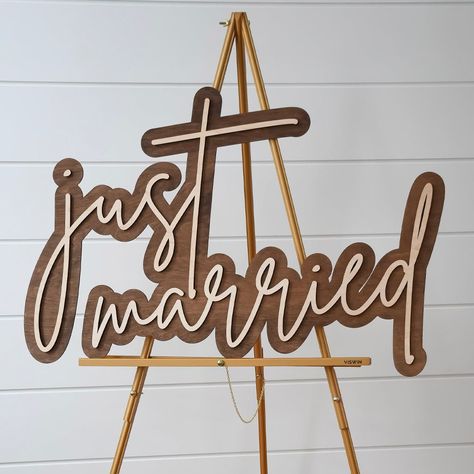 This "just married" wooden sign is a perfect addition for your big day and can be used in Photo props Wedding venue Head table backdrop This wedding decor is crafted using laser cut technology with the option of 2 contrasting colours. The word cut outs are offered in 3 sizes and laser cut on baltic birch wood. Small: 17" wide x 11" height x 1/4" thickness Medium: 24" wide x 16" height x 1/4" thickness Large: 34" wide x 23" height x 1/4" thickness Hang this sign on your wall or backdrop using inv Modern Wedding Cake Toppers, Last Name Sign Wedding, Photo Props Wedding, Boutique Store Displays, Head Table Backdrop, Wood Signage, Wedding Photo Prop, Signage Wedding, Table Backdrop