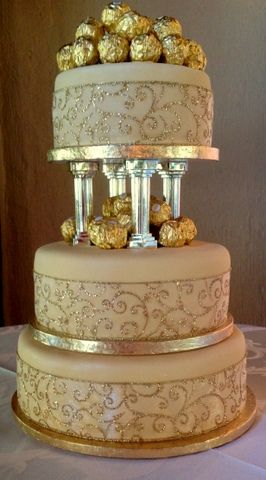 Ferrero Rocher Wedding cake Ferrero Rocher Wedding, Golden Wedding Anniversary Cake, Rocher Cake, Ferrero Rocher Cake, Different Kinds Of Cakes, Quinceanera Cakes, Wedding Cakes With Cupcakes, Decadent Cakes, Ferrero Rocher