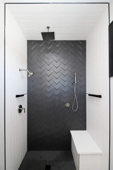 White tile shower with black 3-D tile accent wall and seat. Black Floor Tile Bathroom Ideas, Black Tile Bathroom Ideas, Moody Bathroom Tile, Modern Black Bathroom Design, Dark Shower Tile Ideas, Dark Luxury Bathroom, Black Tile Bathroom, Black Bathroom Tile, Black Shower Tile