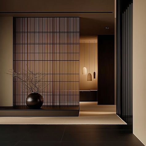 “Japandi style isn’t just seen, it’s felt; it promotes an interior calm as much as it does interior beauty.” A sophisticated blend of minimalism and modern Japandi style. The spaces utilise a muted palette dominated by black, beige, and wooden tones, creating a serene yet elegant atmosphere. The use of clean lines and uncluttered surfaces emphasise simplicity and refinement. Wood panels and black matte surfaces add texture and depth to the rooms, while the strategic lighting highlights the s... Japanese Wall Panel, Black Japandi, Modern Asian Interior Design, Dark Japandi, Japandi Black, Japanese Style Interior Design, Zen Style Interior, Japanese Style Interior, Modern Japanese Interior