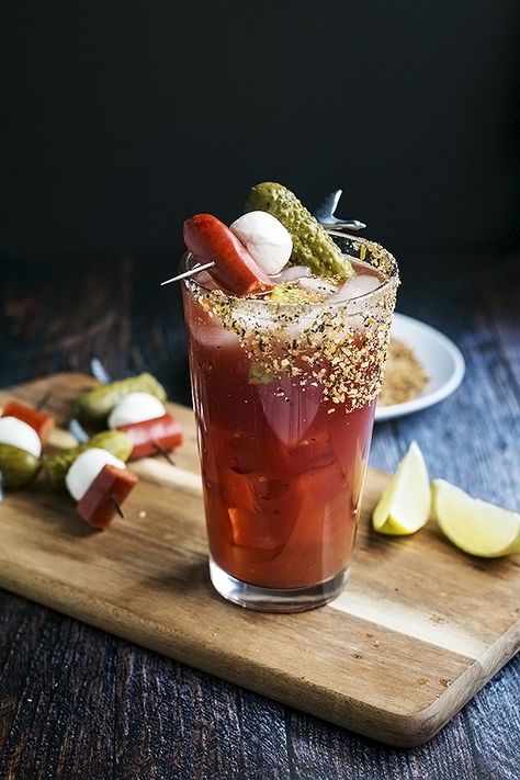 A caesar cocktail with vodka, calmato juice, a dash worcestershire, a dash tabasco sauce, a squeeze of lime, and our secret pickled ingredient.  Pickles! #cookswithcocktails #caesarcocktail #tomatococktail #clamatococktail Caesar Drink Recipe, Caesar Drink, Caesar Cocktail, Caesar Recipe, Pickle Vodka, Steak Spice, Lime Pickles, Tabasco Sauce, Creative Cocktail