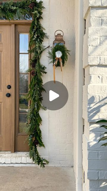 Garland Christmas Front Door, How To Attach Garland Around Front Door, Front Door Garland Ideas, Hanging Garland Around Door, Garland Around Door Frame Inside, Christmas Front Door Decor Ideas, How To Hang Garland Around Front Door, Garland Around Door Frame, How To Hang Garland Around Doorway