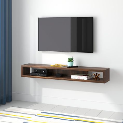 Zipcode Design™ Gulledge Floating TV Stand for TVs up to 50" | Wayfair Open Tv Stand, Floating Shelf Tv Stand, Floating Tv Unit, Floating Tv Stand, Floating Tv, Deco Studio, Cool Tv Stands, Tv Unit Design, Tv Stand Wood