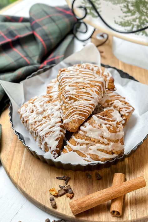 Gingerbread Scones bring instant holiday coziness to your home with these flavorful, delicious scones—tender with cream and molasses and warmly spiced with the season's best flavors. Pour yourself a warm cup of tea, and enjoy this Christmas treat! Fall Scones, Winter Afternoon Tea, Simple Vanilla Icing, Gingerbread Scones, Cinnamon Scones Recipe, Easy Gingerbread, How To Make Gingerbread, Homemade Scones, Irish Butter