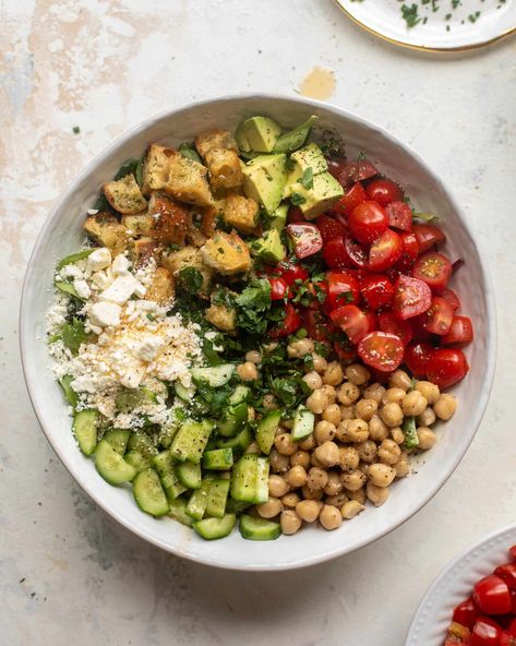 This is my favorite chickpea salad bowl! Loaded with arugula greens, crunchy dill croutons, chickpeas, feta, avocado, cucumbers and tomatoes, this salad tossed in a red wine vinaigrette is a satisfying meal that everyone will love. Salmon Couscous, Bruschetta Pasta, Greek Orzo Salad, Southwest Chicken Salad, Chicken Tortellini Soup, Baked Spaghetti Squash, Tortellini Salad, Veggie Sandwich, Make Ahead Lunches