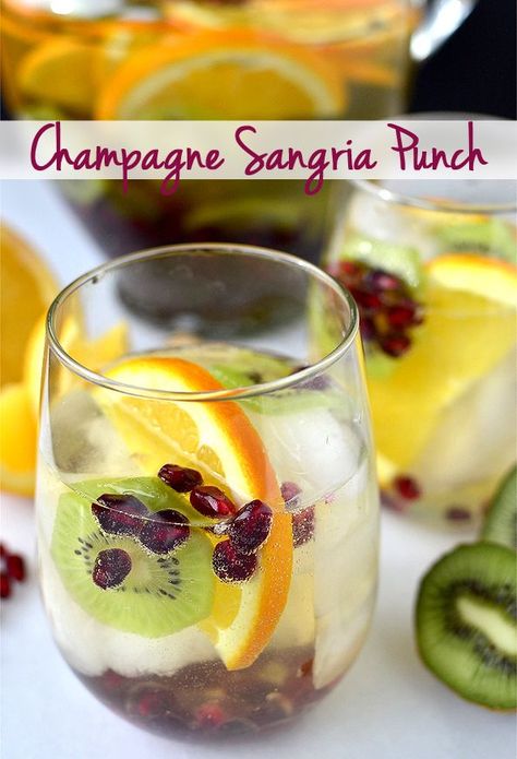 Champagne Sangria Punch is fizzy, just sweet enough, and spiked with fresh fruits. The perfect cocktail for the holidays! | Iowagirleats.com Sangria Thanksgiving, Sangria Christmas, Sangria Fall, Sangria Summer, Champagne Sangria, Easy Sangria, Sangria White, Pomegranate Sangria, Thanksgiving Sangria