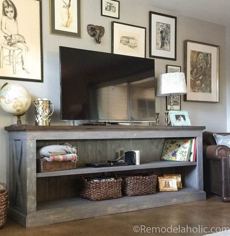 A few months back, we shared this console table on Instagram as one of our #imaremodelaholic features — and you all LOVED it just as much as we did! You know we love the barn door style Xs (see here a Farmhouse Tv Console, Tv Stand Plans, Farmhouse Entertainment Center, Farmhouse Style Living Room, Play Kitchens, Diy Tv Stand, Farmhouse Tv Stand, A Living Room, Furniture Projects