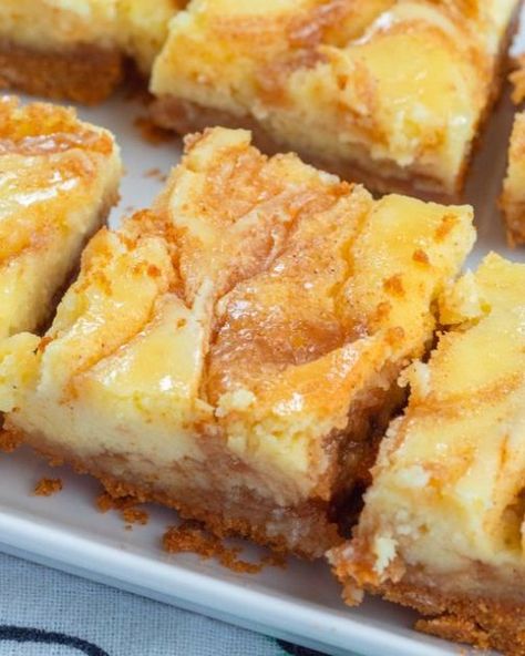 Cinnamon Roll Cheesecake Bars, Roll Cheesecake, Cinnamon Cheesecake, Cinnamon Roll Cheesecake, Cake Bars, Creamy Cheesecake, Cheesecake Bars, Graham Cracker Crumbs, Cinnamon Roll