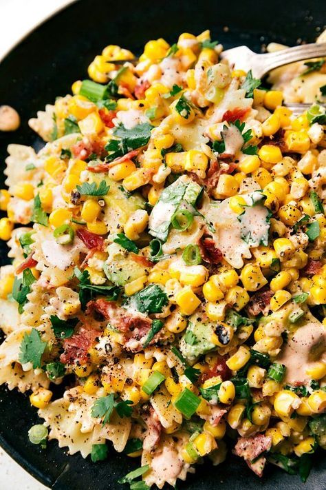 One of the most popular recipes on this site: Mexican Street Corn Pasta salad! Tender pasta, charred corn, & the best chili-lime dressing! ... less by Chelsea's Messy Apron Pasta Salad Bacon, Pasta Mexicana, Mexican Street Corn Pasta Salad, Mexican Street Corn Pasta, Low Carb Veggie, Creamy Chili, Street Corn Pasta Salad, Street Corn Pasta, Corn Pasta Salad