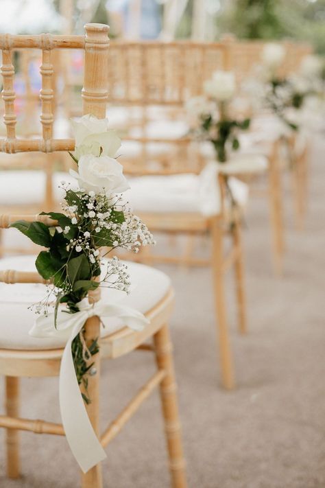 White rose and gypsophila wedding chair decor for a classic and traditional wedding | Kirsty Louise Photo | <a href="https://www.rockmywedding.co.uk/christian-wedding" target="_blank" rel="noopener">See more of this wedding</a> Wedding Chair Markers, Simple Wedding Chair Decor, Aisle Ideas For Wedding, Ceremony Chair Flowers, Wedding Ceremony Signing Table, Simple Wedding Aisle Decor, Wedding Chairs Diy, Wedding Chair Decor, Wedding Ceremony Chairs