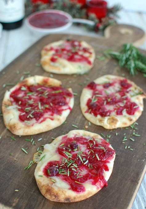 Warm Brie Cranberry Naan is a festive, naan-traditional holiday appetizer. Mini naan bread is topped with warm, creamy brie cheese, a sweet cranberry sauce, and finished off with freshly chopped rosemary.// A Cedar Spoon AD Mini Naan Bread, Warm Brie, Mini Naan, Naan Recipes, Brie Cranberry, Recipes With Naan Bread, Healthy Christmas Recipes, Spaghetti Meatballs, Naan Recipe