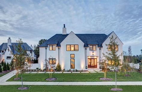 12 best custom home builders in Charlotte - Axios Charlotte Tudor House Exterior, Mansion Exterior, Tudor Style Homes, Dream Life House, European House, Modern Farmhouse Exterior, Tudor House, Parade Of Homes, Luxury Homes Dream Houses