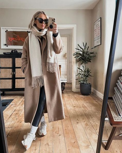 Pascale Banks on Instagram: "Moving this shot to the grid as the love for my coat in dms was crazy and im sorry if I haven’t replied yet 🙈 This was one of my best @bicestervillage purchases a couple of years ago from @maxmara definitely a piece I’ll have in my wardrobe forever 🫶🏻 Spot zigs photobombing, 🤣 * * Scarf @ganni Leggings @wearcommando Sunglasses @lespecs Trainers @newbalance Socks @sweatybetty" Trainers Socks And Leggings, Long Coat Leggings Outfit, Socks And Trainers Outfit, Maxmara Coat Outfit, Coated Leggings Outfit, Ganni Scarf, Maxmara Coat, Sporty Chic Outfits, Trainers Outfit