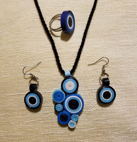 Paper quilling, evil eyes by Alev Paper Quilling Evil Eye, Quilling Necklace, Paper Quilling Jewelry, Paper Quilling Patterns, Quilled Jewellery, Quilling Ideas, Quilling Jewelry, Evil Eyes, Quilling Patterns