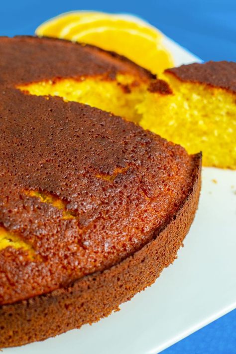 A soft and moist Sicilian orange cake that you can make quick and easy at home. A bright orange flavor that you can obtain only if you're using fresh whole oranges. Ideal desert if you have only one hour to put a cake on the table. #siciliandessersts #orangecake #baking #italiancooking #gocookyummy Moroccan Orange Cake Recipe, Sicilian Orange Cake Recipe, Orange Cake Recipe Moist, Fresh Orange Cake, Moist Orange Cake, Orange Recipes Dessert, Whole Orange Cake, Orange Birthday Cake, Orange Sponge Cake