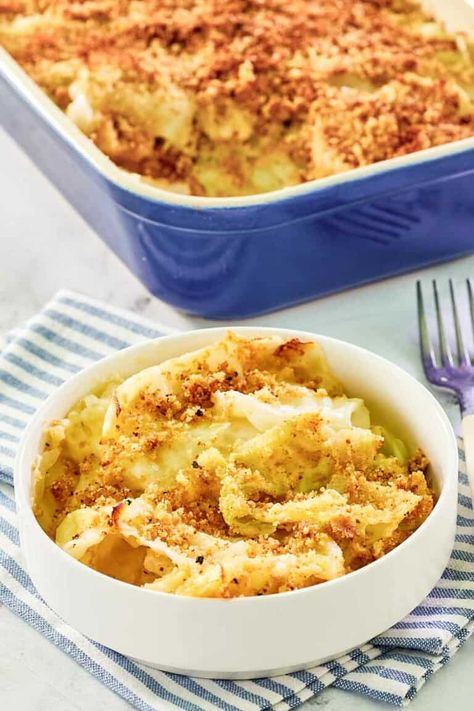 Indulge in the ultimate comfort food with this delicious Scalloped Cabbage Casserole! Savor the perfect blend of tender cabbage, creamy sauce, crunchy breadcrumb topping that’s baked to golden perfection. Get the easy recipe and find out how to make the best cabbage casserole for dinner. Elevate your weeknight meals or holiday gatherings with this mouth-watering, family-favorite side dish. Escalloped Cabbage Casserole, Cabbage Bake Casseroles, Baked Cabbage With Bacon, Easy Baked Cabbage Recipes, Scalloped Cabbage Pioneer Woman, Scalloped Cabbage Casserole, Scalloped Cabbage Recipes, Cabbage Side Dishes, Baked Cabbage Recipes