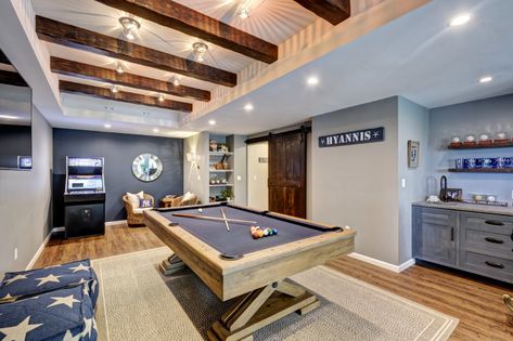 A Beachy Basement Design Perfect for Entertaining - Beach Style - Basement - New York - by Amazing Spaces | Houzz Lake House Basement Ideas, Beach House Basement, Lake House Basement, Modern Scandinavian Interior, Support Columns, Finished Basement Ideas, Basement House, Basement Makeover, Blank Slate