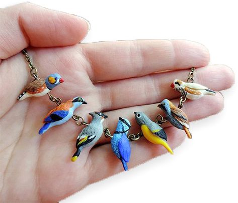 Ukraine's Darya Tarasenko (SoFoxyClay) delights us with her sculpted polymer birds on a wire. What a great gift for a birder. And perfect for a summer Friday. You can get to know Darya best on Pinterest. Then keep going on Facebook, Instagram, [...] Polymer Clay Kunst, Cute Beads, Bird Sculptures, Jewelry Clay, Bird Flying, Beads Ideas, Tanah Liat, Polymer Clay Animals, Clay Animals