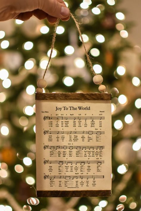 How to make a DIY Christmas music page wall hanging or ornament-11 Hymnal Crafts, Sheet Music Ornaments, Music Christmas Ornaments, Sheet Music Crafts, Music Ornaments, Christmas Sheet Music, Music Crafts, How To Craft, Christian Christmas